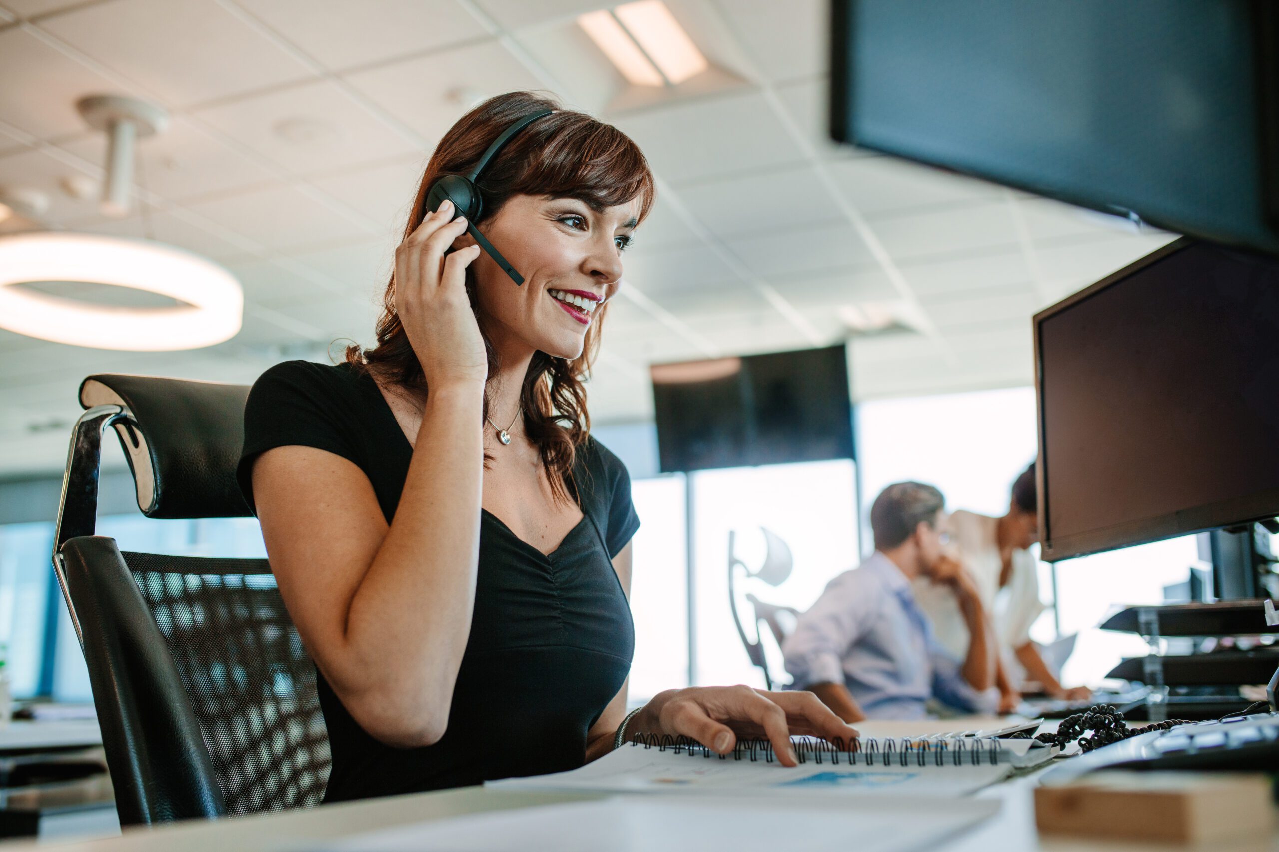 Female in Customer Service Position Talking on the Phone